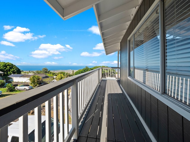 balcony featuring a water view