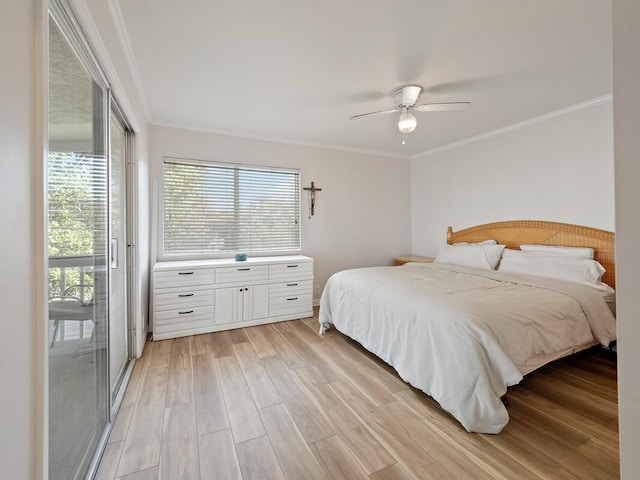 bedroom with ornamental molding, light wood-type flooring, and a ceiling fan