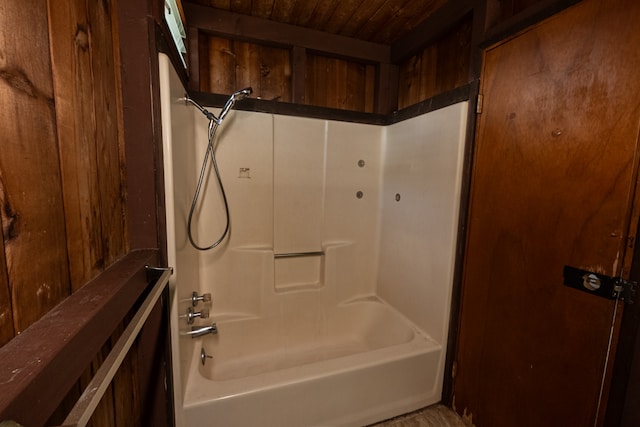 bathroom with shower / tub combination and wooden ceiling