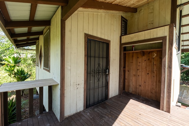 entrance to property featuring a deck