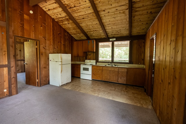 kitchen with lofted ceiling with beams, wood ceiling, sink, wood walls, and white appliances