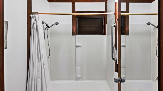 bathroom featuring shower / bath combination with curtain