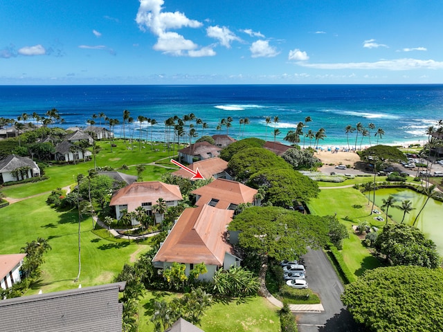 birds eye view of property featuring a water view and a view of the beach