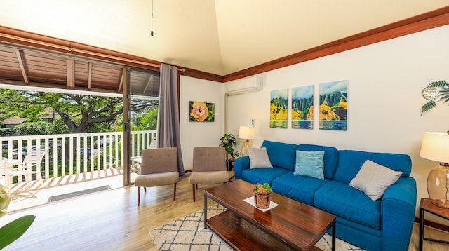 living room featuring vaulted ceiling, light hardwood / wood-style floors, and a wall mounted air conditioner