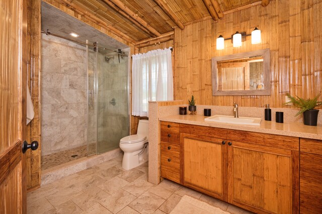 bathroom featuring vanity, wood ceiling, wood walls, a shower with shower door, and toilet