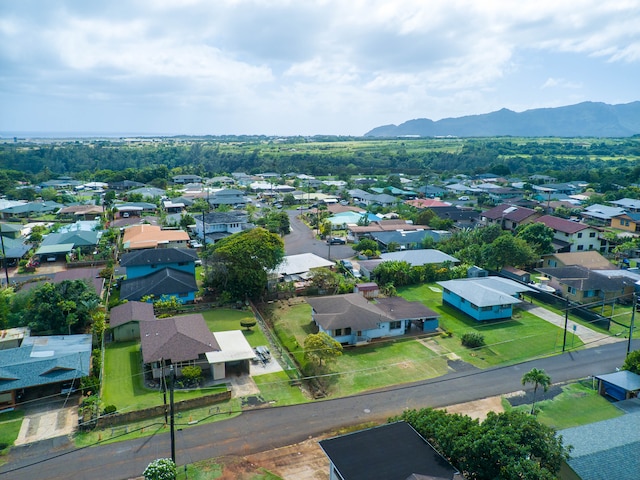 birds eye view of property featuring a mountain view