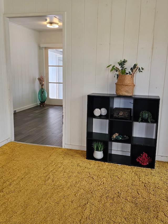 interior space featuring wooden walls