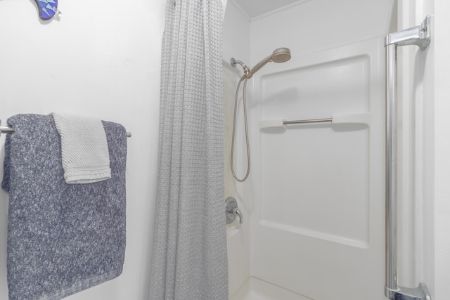 bathroom with a shower with curtain