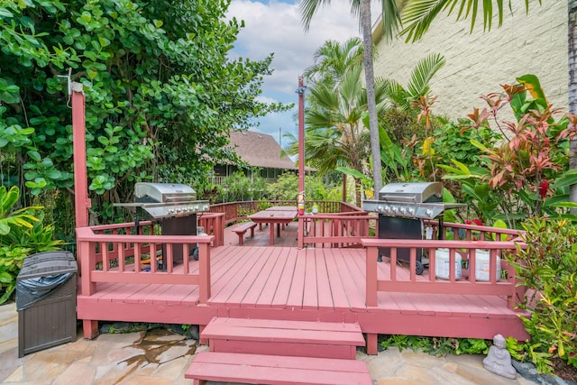 deck featuring a grill