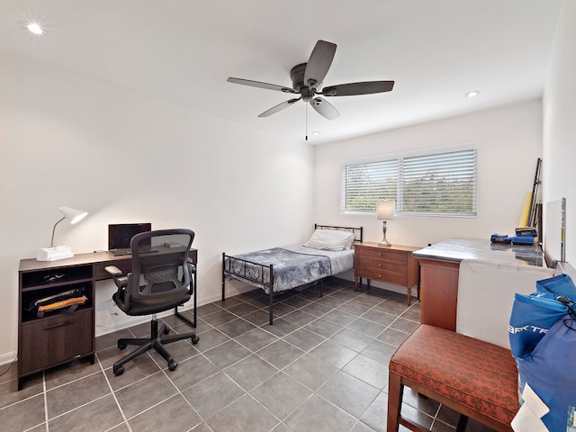 bedroom featuring tile patterned flooring and ceiling fan