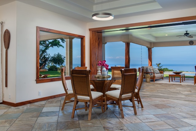 dining space with ceiling fan and plenty of natural light