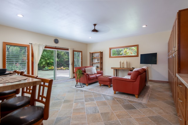 living room with ceiling fan