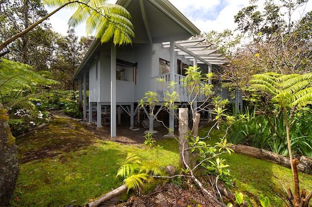 view of home's exterior featuring a yard