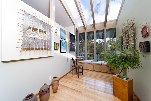 sunroom featuring a skylight