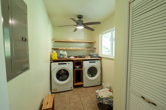 laundry room with separate washer and dryer, light tile patterned flooring, electric panel, and ceiling fan