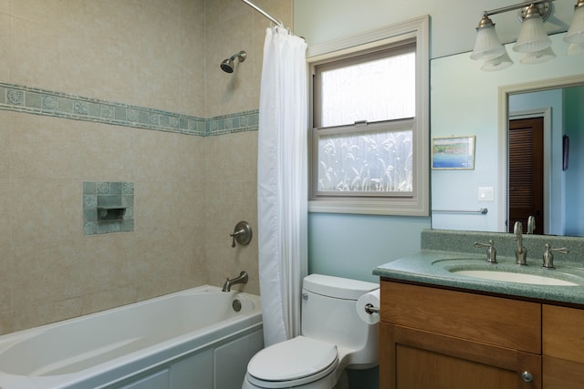 full bathroom with vanity, toilet, and shower / bath combination with curtain