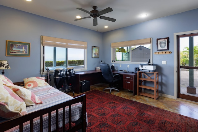 bedroom featuring access to outside, multiple windows, and ceiling fan