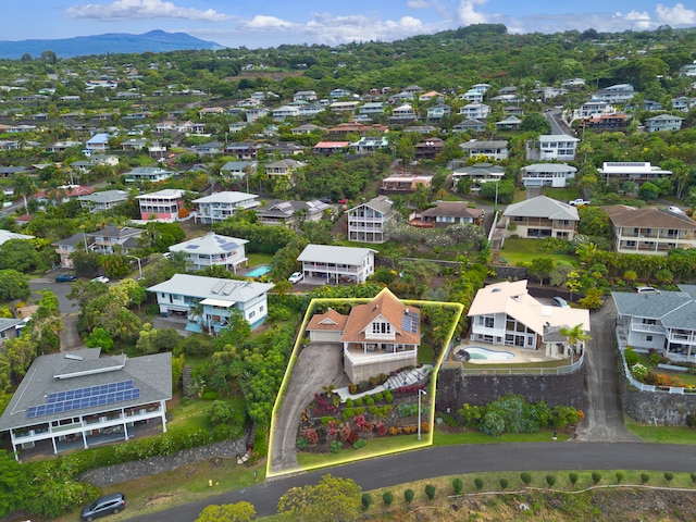 drone / aerial view featuring a mountain view