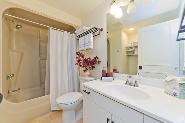 full bathroom with tile patterned flooring, vanity, shower / bath combo with shower curtain, and toilet