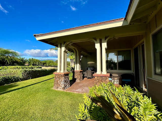 view of yard with a patio area