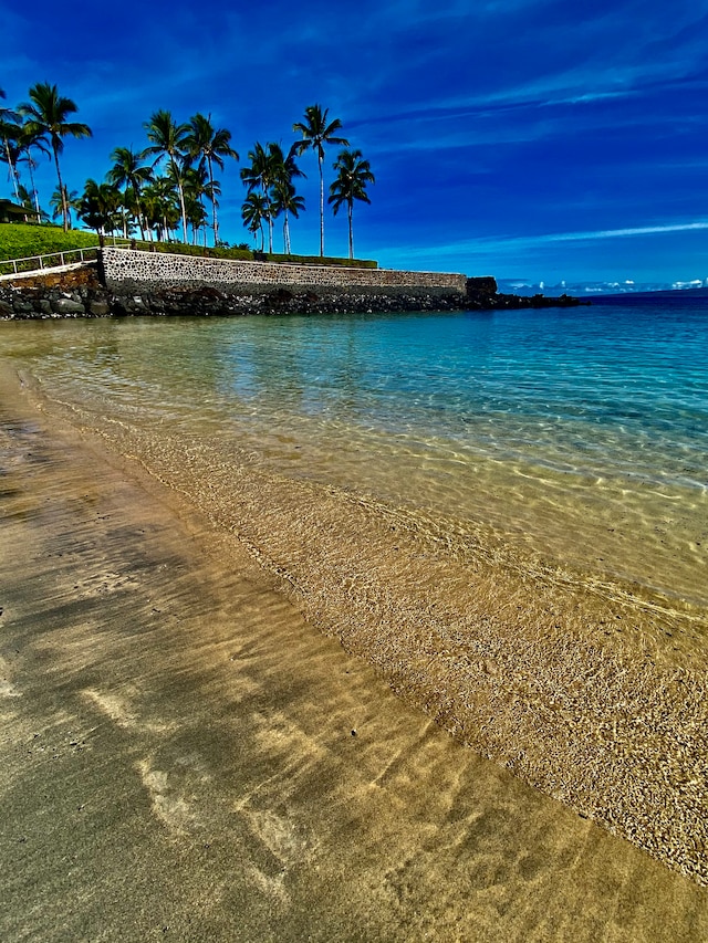 property view of water featuring a beach view