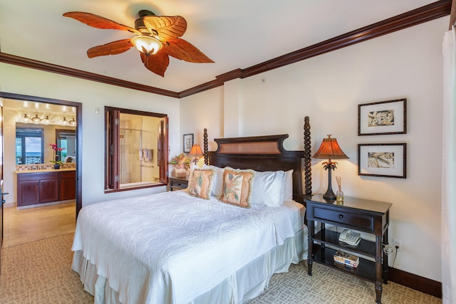 bedroom with ornamental molding, connected bathroom, and ceiling fan