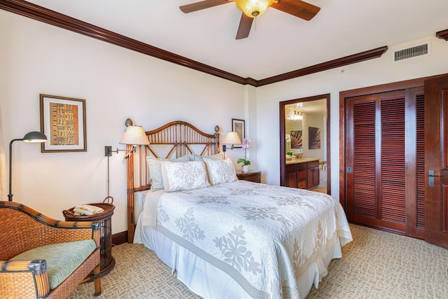 bedroom featuring ornamental molding, light carpet, ceiling fan, and connected bathroom