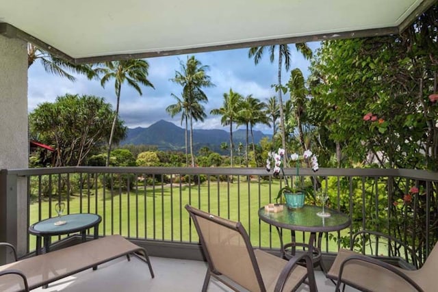 balcony featuring a mountain view