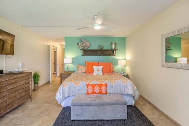 bedroom featuring ceiling fan and light tile patterned floors