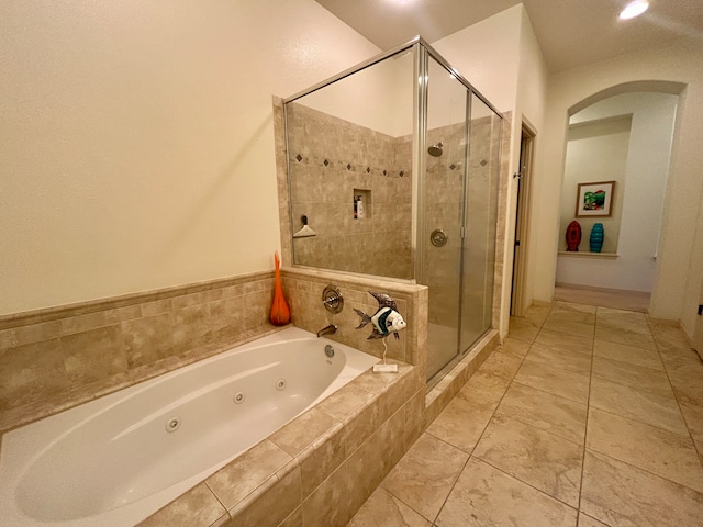 bathroom featuring plus walk in shower