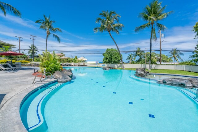 view of swimming pool with a patio