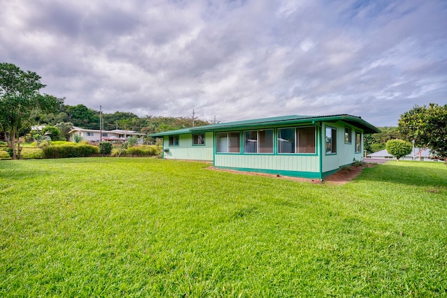 view of front of home with a front yard