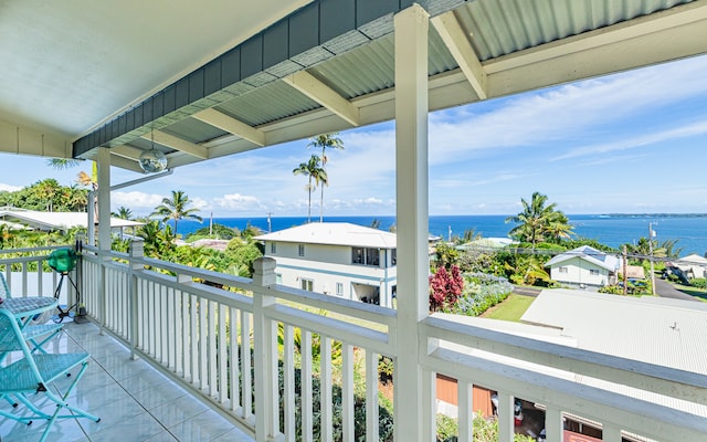 balcony featuring a water view