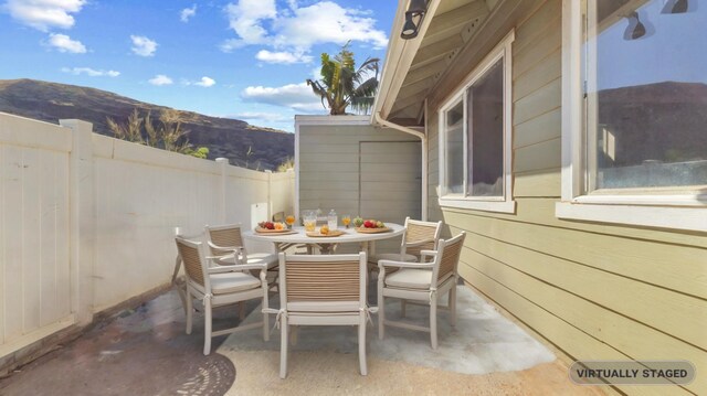 view of patio featuring a mountain view