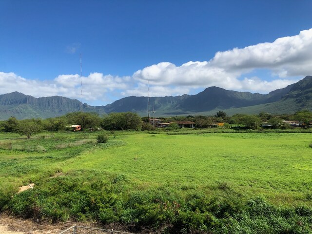 property view of mountains featuring a rural view