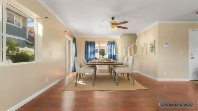 dining room featuring ornamental molding, hardwood / wood-style floors, and ceiling fan