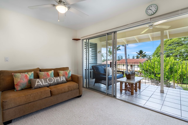 living room featuring carpet and ceiling fan