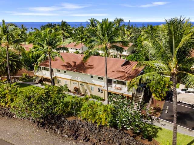 birds eye view of property featuring a water view