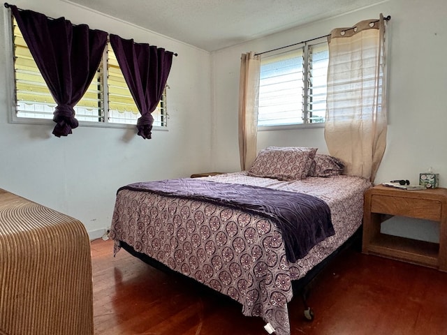 bedroom featuring hardwood / wood-style floors