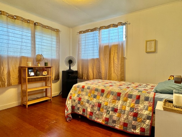 bedroom featuring dark wood-type flooring