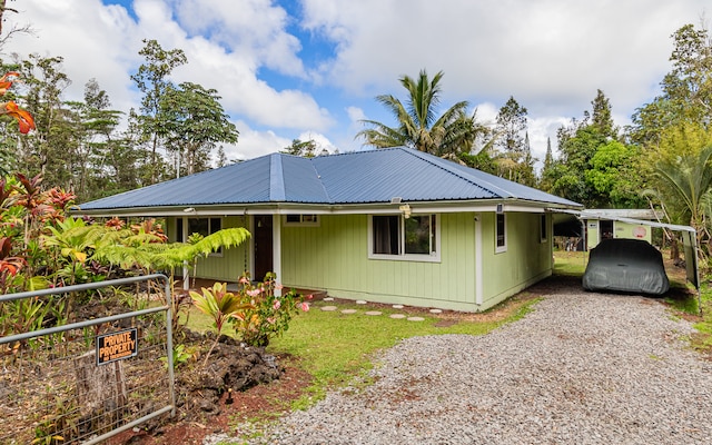 view of front of house with a carport