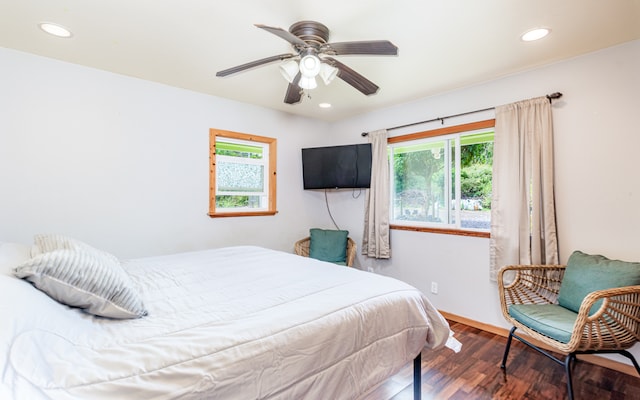 bedroom featuring ceiling fan and hardwood / wood-style floors