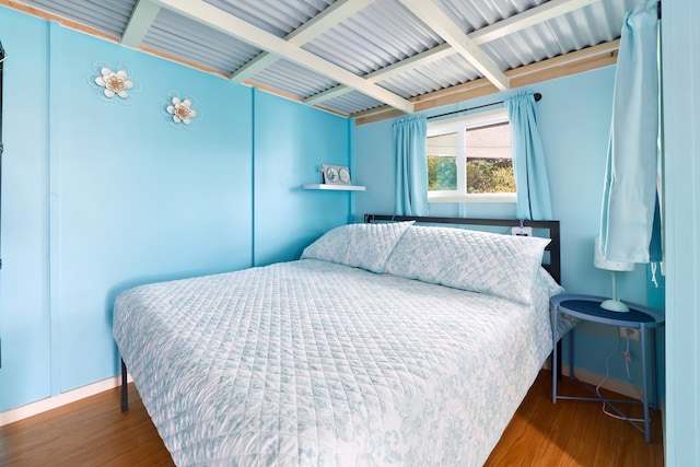 bedroom featuring hardwood / wood-style flooring