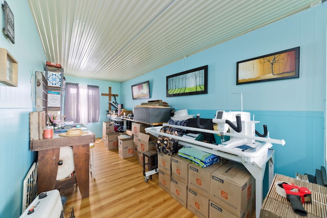 office area with light hardwood / wood-style floors