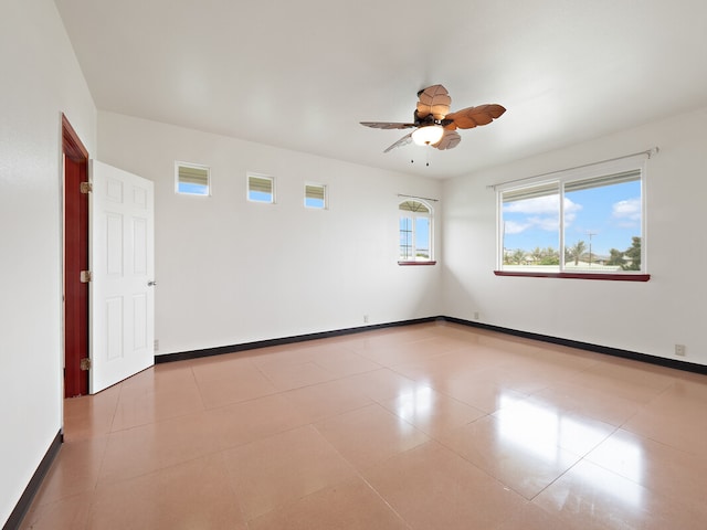 unfurnished room featuring ceiling fan