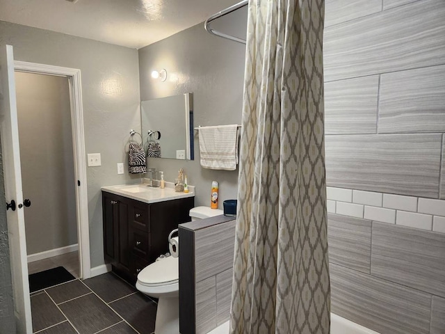 bathroom featuring vanity, tile patterned floors, toilet, and a shower with shower curtain