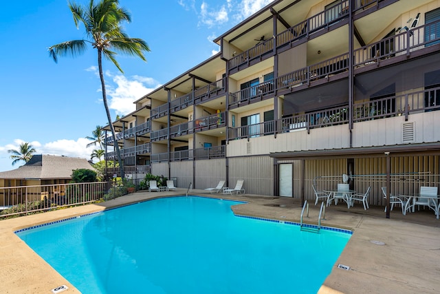 view of swimming pool featuring a patio