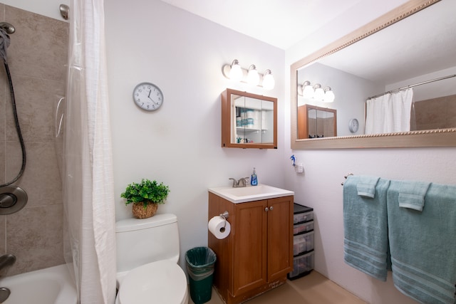 full bathroom featuring vanity, shower / bath combo with shower curtain, and toilet