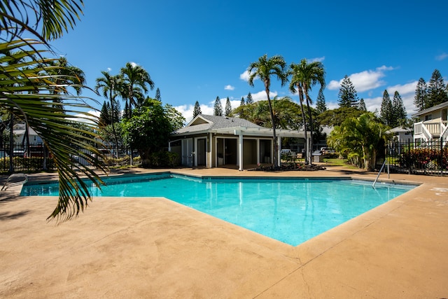 view of swimming pool featuring a patio area