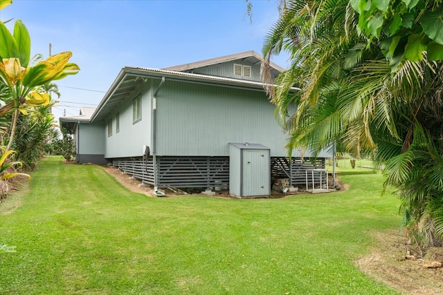 view of home's exterior with a yard